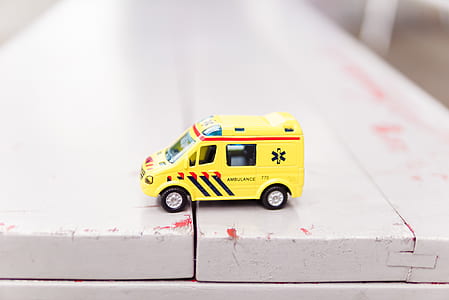 yellow Ambulance toy car thumbnail