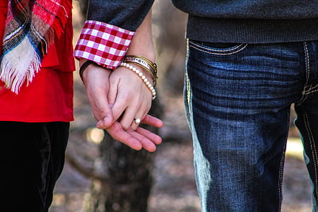 man and woman holding hands thumbnail