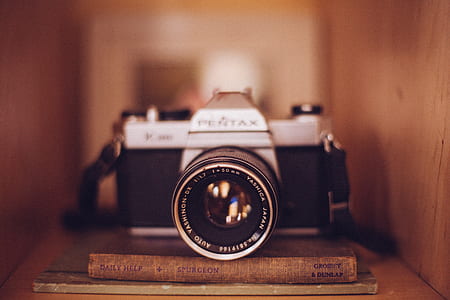 black and grey Pentax camera thumbnail