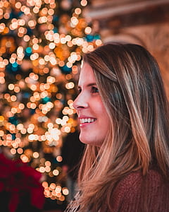 woman smiling bokeh photography thumbnail