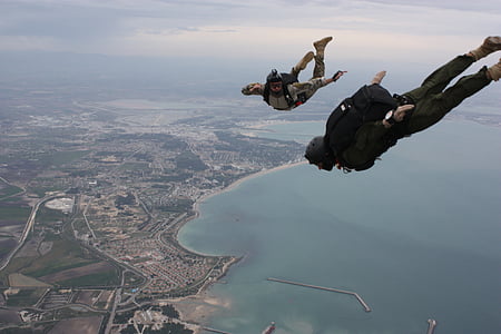 two men doing sky diving at daytime thumbnail