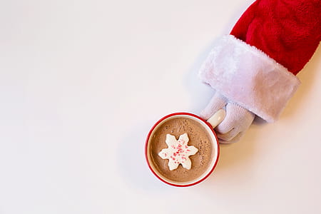 white ceramic teacup with brown coffee thumbnail