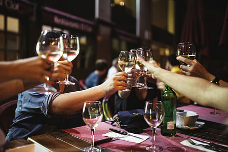 Friends at a restaurant drinking wine thumbnail