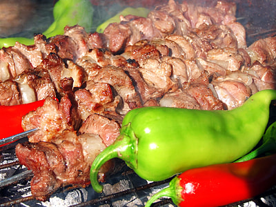 pork barbecue beside bell pepper on grill thumbnail