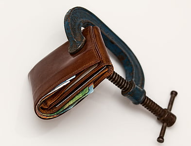 blue C clamping a brown leather wallet thumbnail