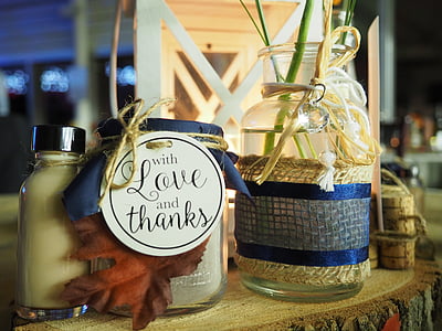 clear glass jar on brown wooden table thumbnail