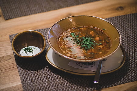 Brown Ceramic Bowl With Brown Soup thumbnail
