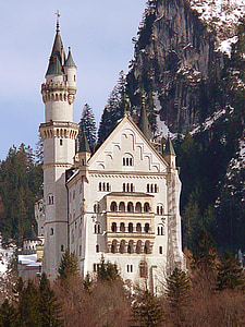 white and beige castle near mountain thumbnail
