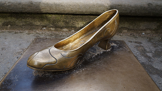 gold-colored block heel almond-toe shoe on black surface thumbnail