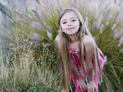 girl wearing pink dress and pink skinny jeans thumbnail
