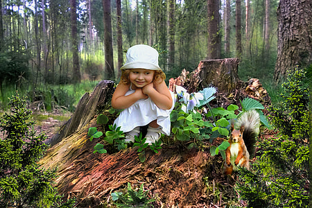 girl sitting on tree with squirrel thumbnail