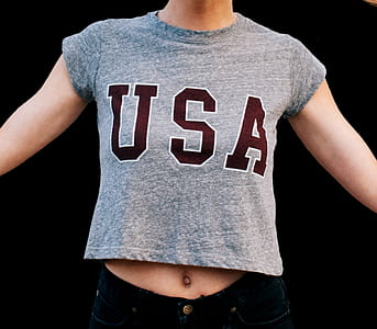 woman wearing gray and maroon USA crew-neck cap-sleeved crop-top thumbnail