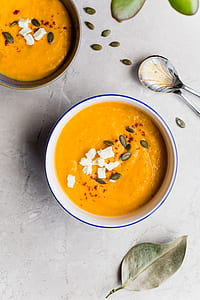 squash porridge on white ceramic plate thumbnail