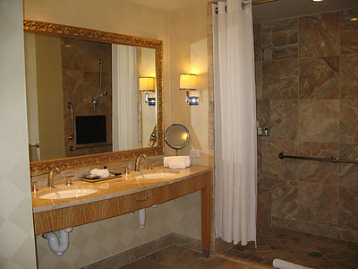 gray makeup mirror on top brown vanity table thumbnail