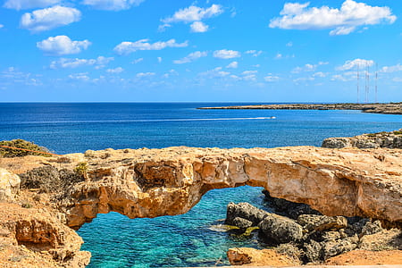 blue ocean under blue sky thumbnail