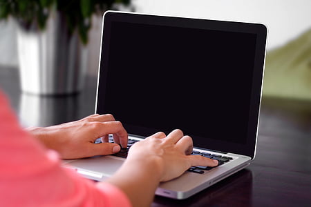 person using MacBook Pro thumbnail
