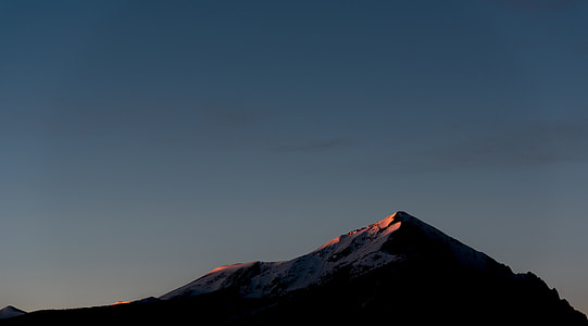 rock mountain under blue sky thumbnail