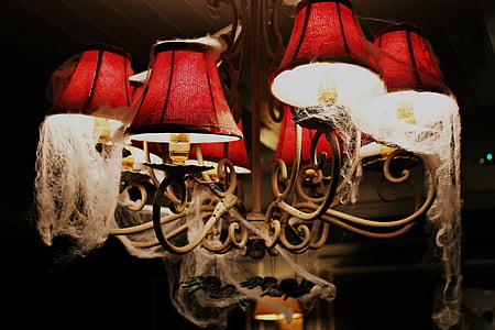 turned-on brown and red uplight chandelier thumbnail