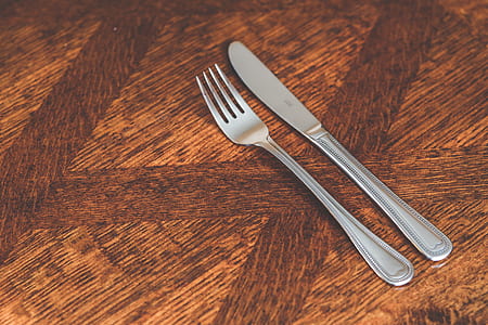 grey stainless steel fork and steak knife thumbnail