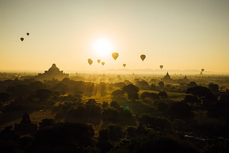 hot air balloons flying during sunset thumbnail