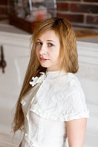 woman wearing white top thumbnail