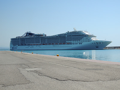 white cruise ship on blue body of water thumbnail