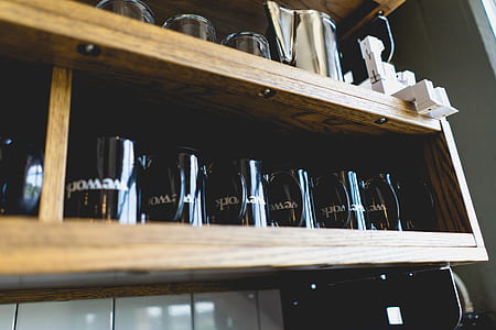 black mug on wooden cabinet thumbnail