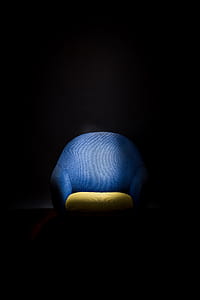 blue sofa chair with spotted light thumbnail