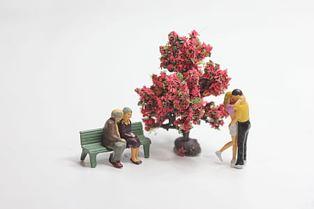 two couples and tree figurines thumbnail