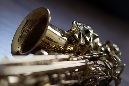 selective focus photo of gold-colored saxophone thumbnail