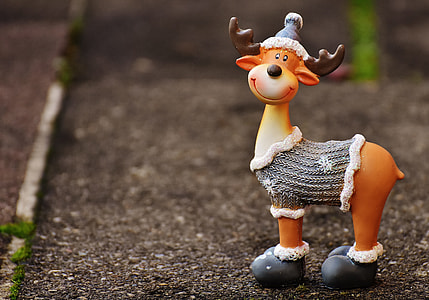 orange Reindeer with hat and shirt figurine thumbnail