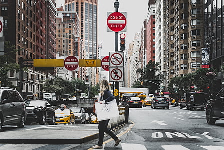 woman walking on road thumbnail