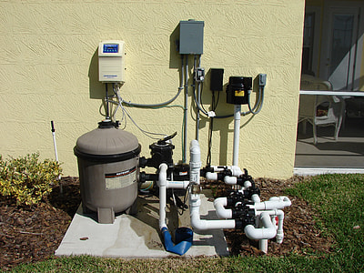 white and gray pool pump at daytime thumbnail