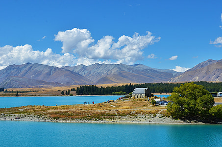 house on land surrounded by body of water thumbnail