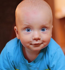Baby Wearing Blue Crew Neck Shirt thumbnail