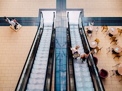 two women on escalator thumbnail