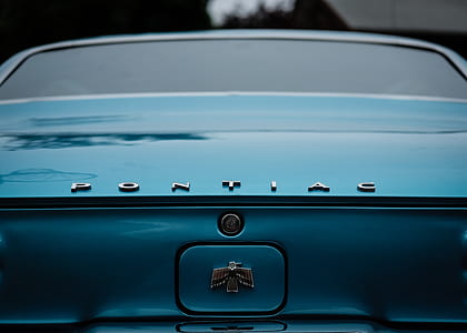 close up photo of blue Pontiac vehicle thumbnail