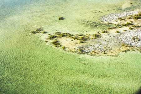 aerial view photography of an island thumbnail