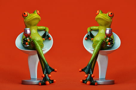 two green frog holding wine glasses sitting on chairs clip art thumbnail