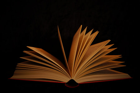 book opened with black background thumbnail