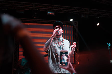 man holding microphone thumbnail