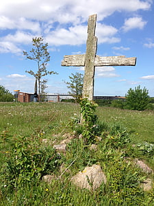 wooden cross on ground thumbnail