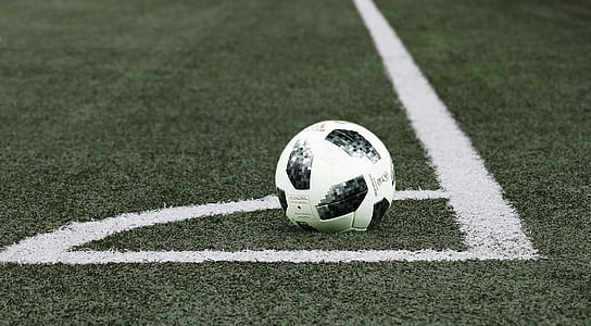 black and white soccer ball on corner thumbnail