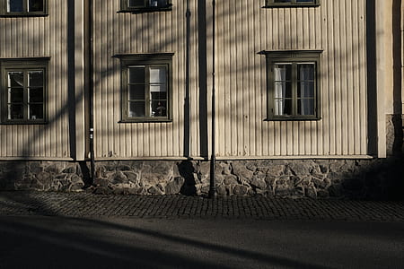 black metal post near white wooden house thumbnail