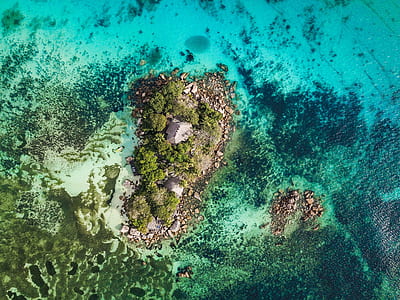 birds eyeview photography of island thumbnail