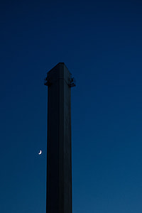 high rise building under blue sky during nighttime thumbnail