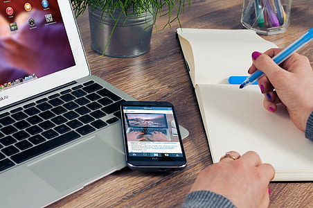Black Htc Android Smartphone on Macbook Air thumbnail