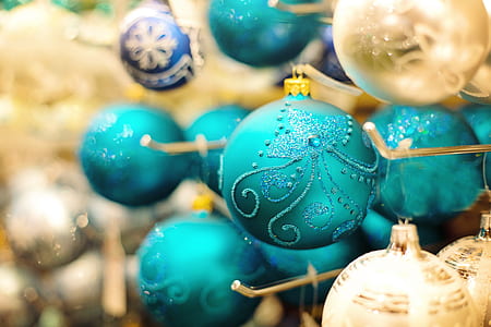 closeup photo of blue glittered bauble thumbnail