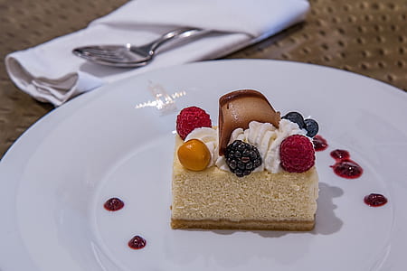 selective focus photography of sliced cake with berries thumbnail