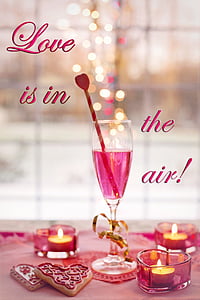 clear wine glass with Love is in the air! text overlay thumbnail